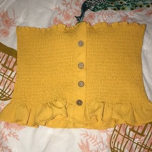 Yellow sleeveless crop top